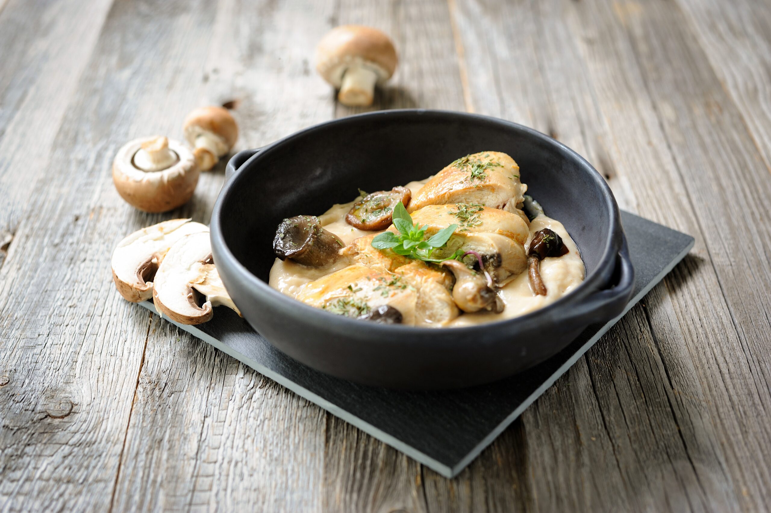 Guinea fowl with wild mushrooms