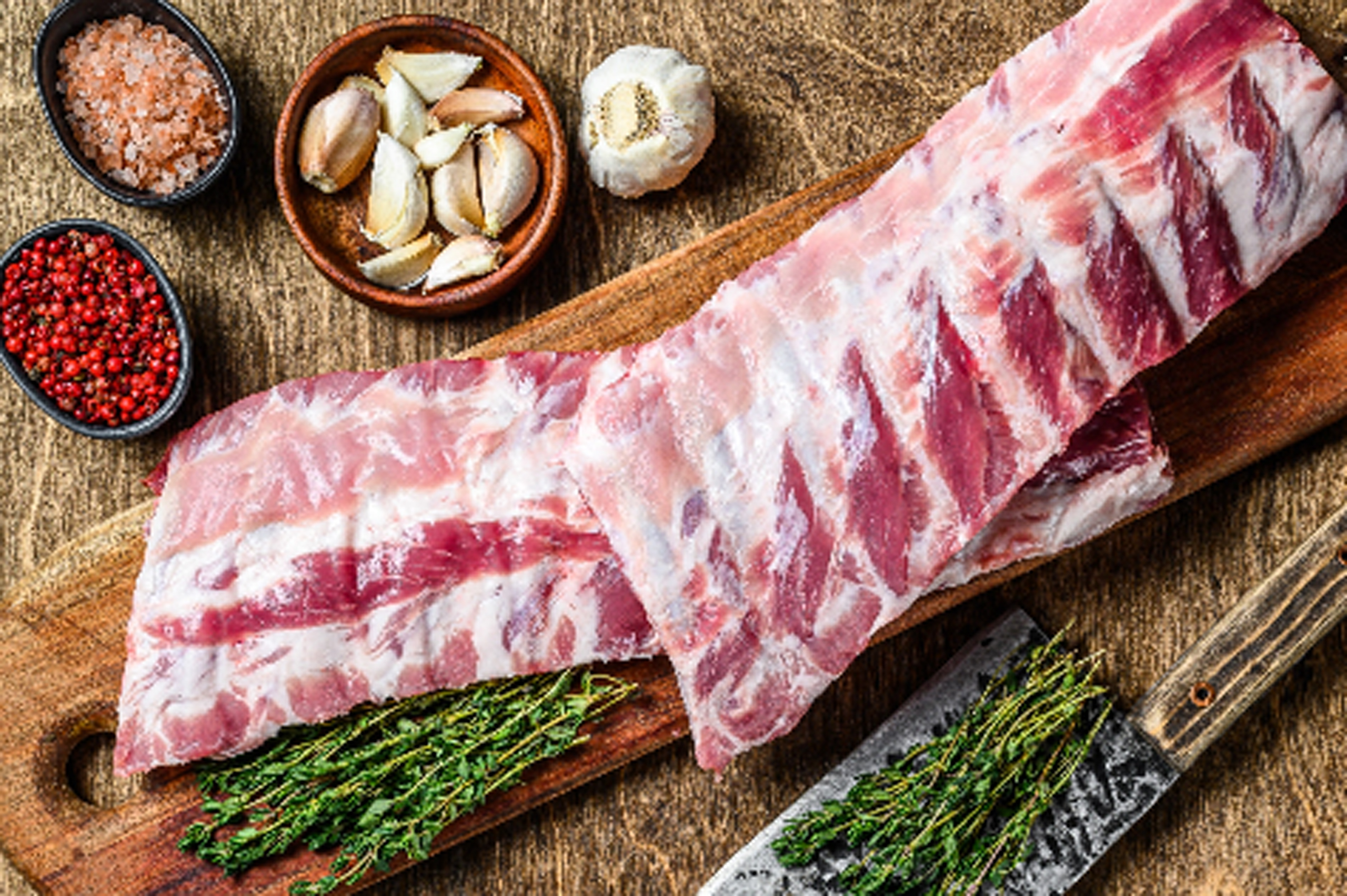 raw-pork-rack-spare-ribs-with-spices-garlic-clove-2021-12-09-02-46-17-big