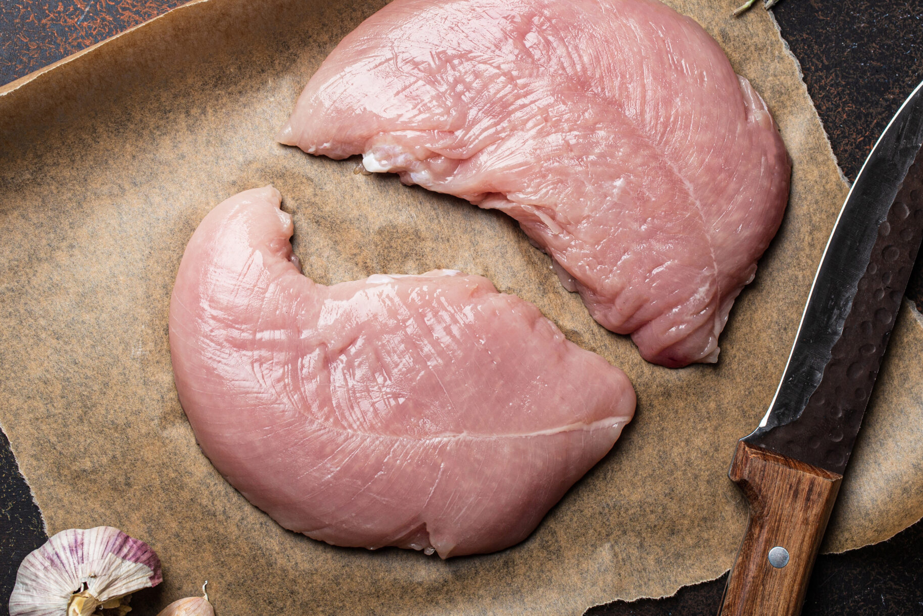 turkey-lean-raw-fillet-on-baking-paper-with-rosema-2022-02-08-23-59-42-utc-scaled_small